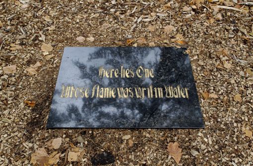 Danh Vo, Tombstone for Phùng Vo, 2010. Black absolute granite and gold, engraving from writing by Phùng Vo, 64 x 90 x 8 cm. — © Photo: Walker Art Center, Minneapolis.