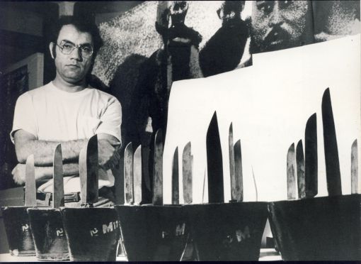 Morteza Momayez in his studio, standing next to his work for Volume and Environment 2