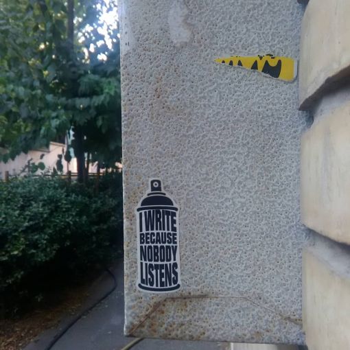 Noor, “I Write because No One Listens,” sticker, Niavaran, Tehran, fall 2019. — © Photo: Helia Darabi.