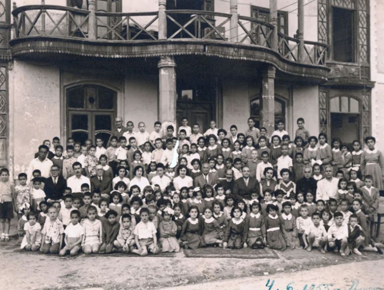 Students, teachers and trustees of Armenian School in Rasht, 1953. — ©  Photo credit: Peyman, Armenian Cultural Quarterly.