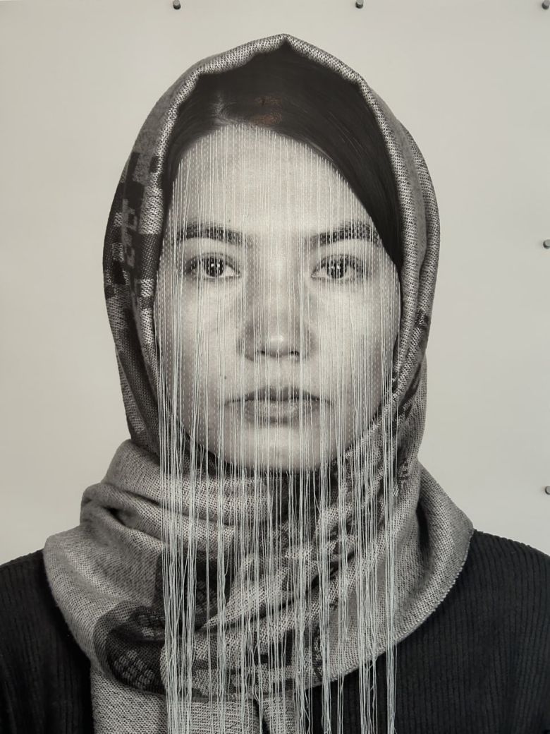 Latifa Zafar Attaii, Self-Portrait, 2024-25. Thread on Digital Print, 130 × 100 cm.  — © Courtesy of the artist.